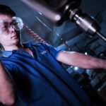 How can tin can manufacturer control corrosion and surface defects?