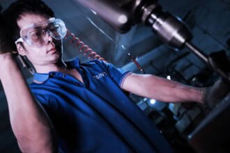 How can tin can manufacturer control corrosion and surface defects?